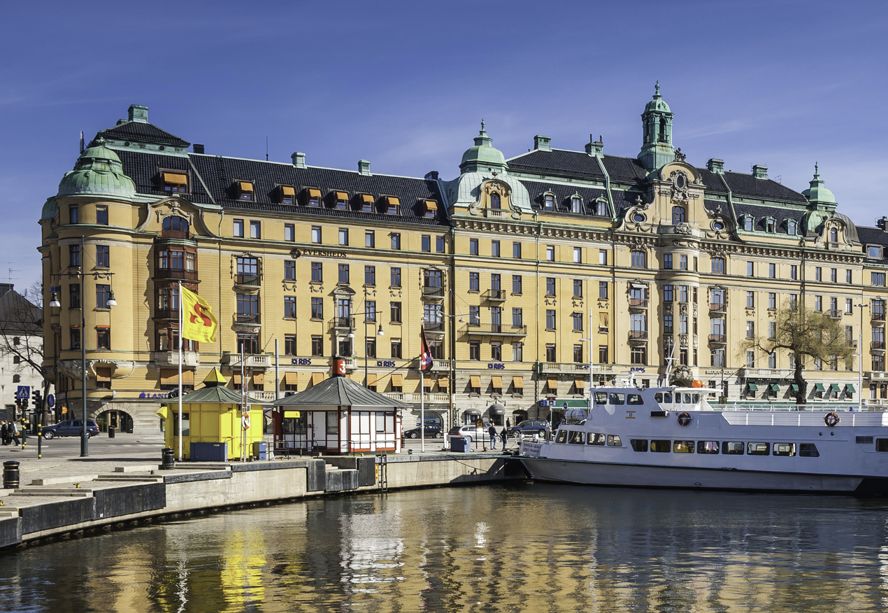 Stockholm Ostermalm waterfront and Strandvagen reflecting in Nybroviken Sweden